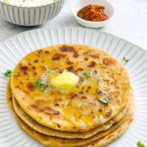 aloo paratha with tomato sauce